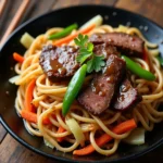 Homemade Beef Chow Mein with tender beef strips, stir-fried vegetables, and egg noodles in a savory soy-based sauce